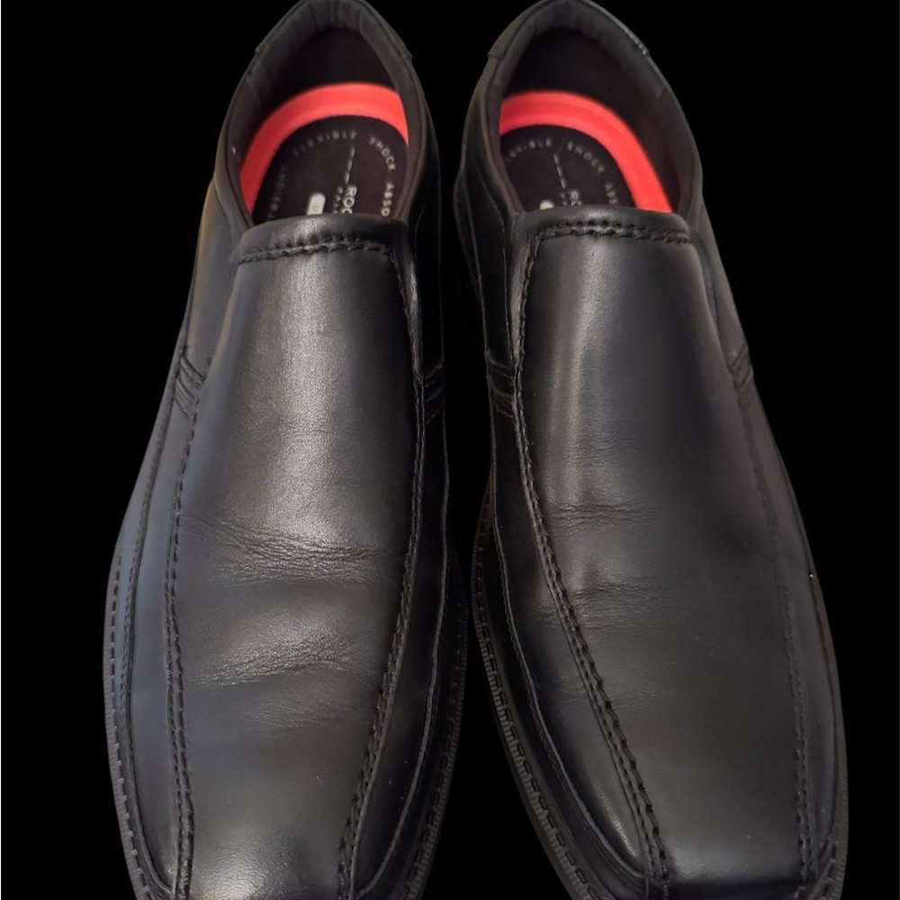 ROCKPORT Sleek Black Slip-On Loafers with Red Lining